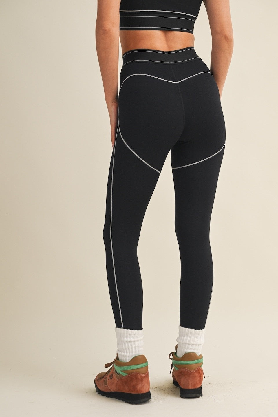 Sculpting, supportive, and designed for movement, these high-rise leggings feature strategic contour seams that flatter your natural shape while delivering comfortable stretch and a streamlined fit.