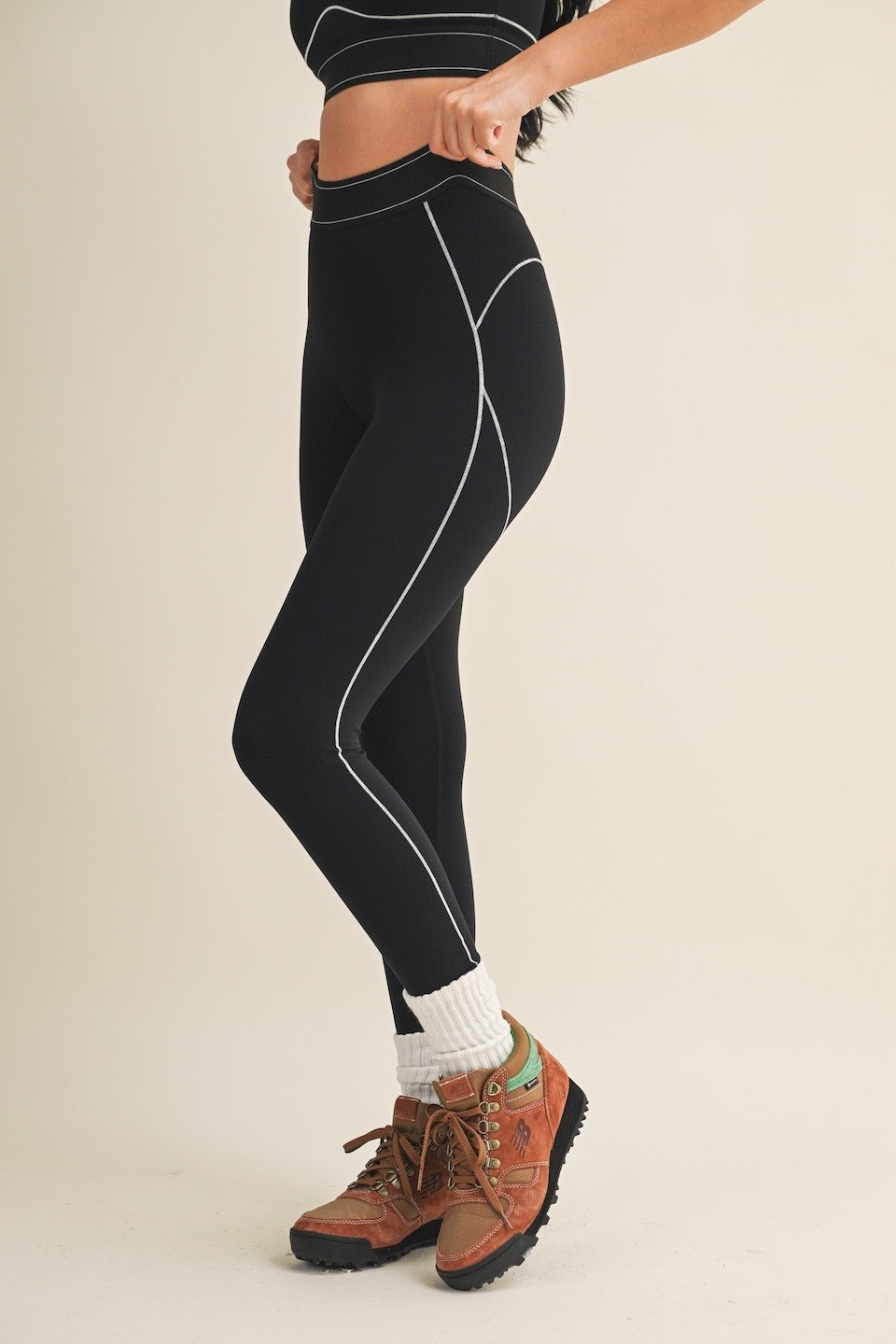 Sculpting, supportive, and designed for movement, these high-rise leggings feature strategic contour seams that flatter your natural shape while delivering comfortable stretch and a streamlined fit.