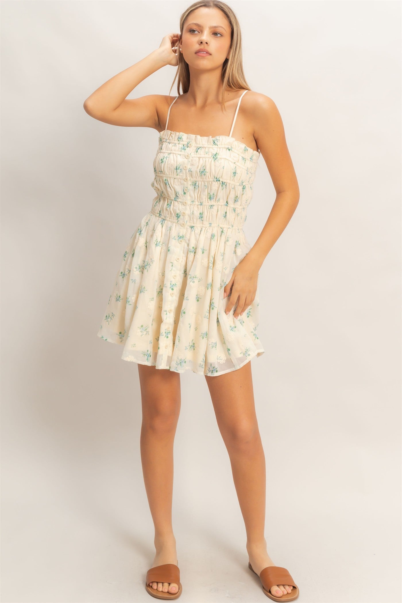 Floral Shirred Mini Dress features a fully shirred bodice, adjustable spaghetti straps