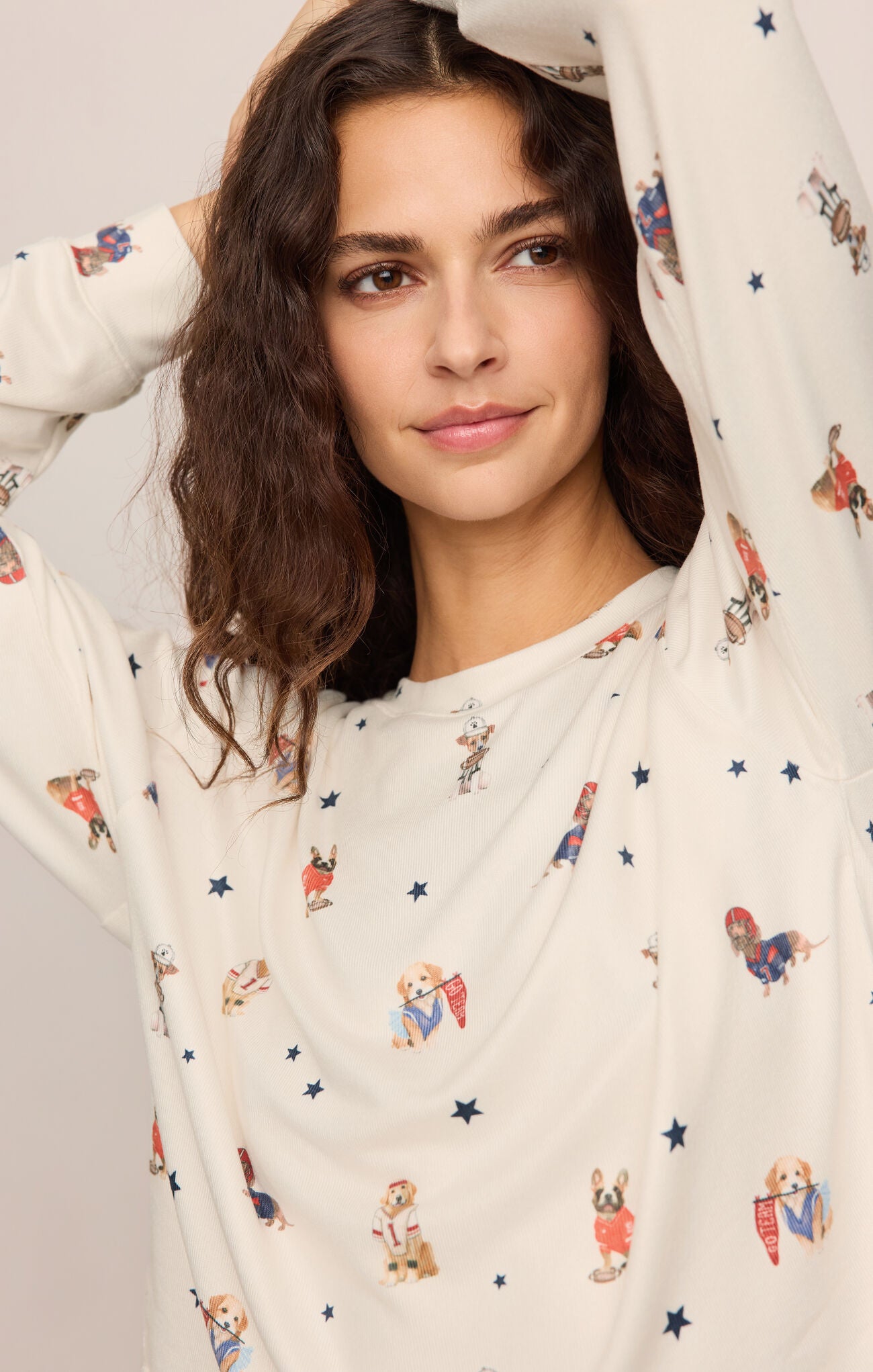 A luxurious silky jersey sleep top featuring a soft crew neckline, long sleeves, and a comfortable stretch fit for restful nights and relaxed mornings.