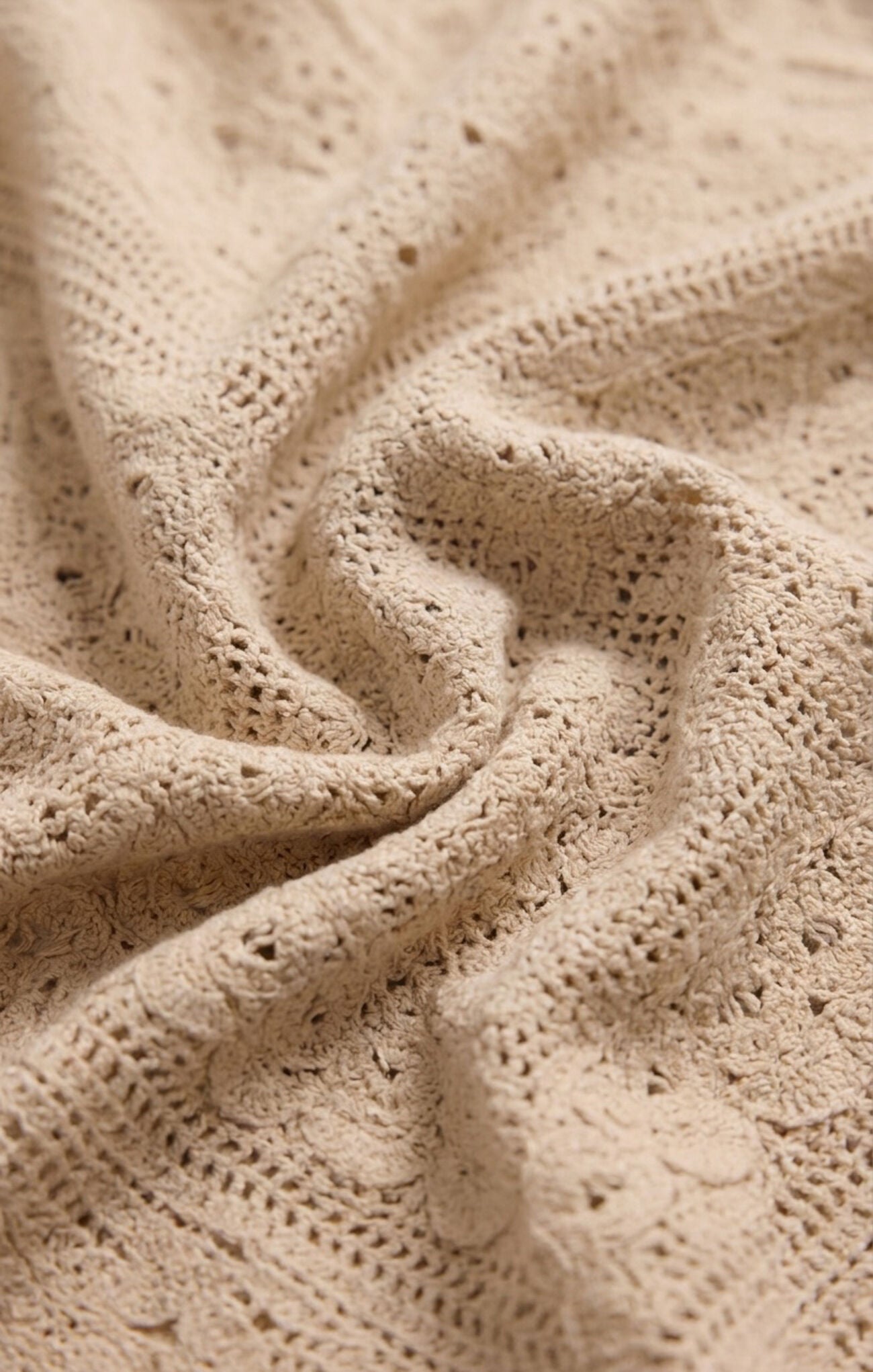 A timeless high-rise crochet cotton mini skirt featuring a flattering silhouette, full lining, and a sleek side zipper for effortlessly polished style.