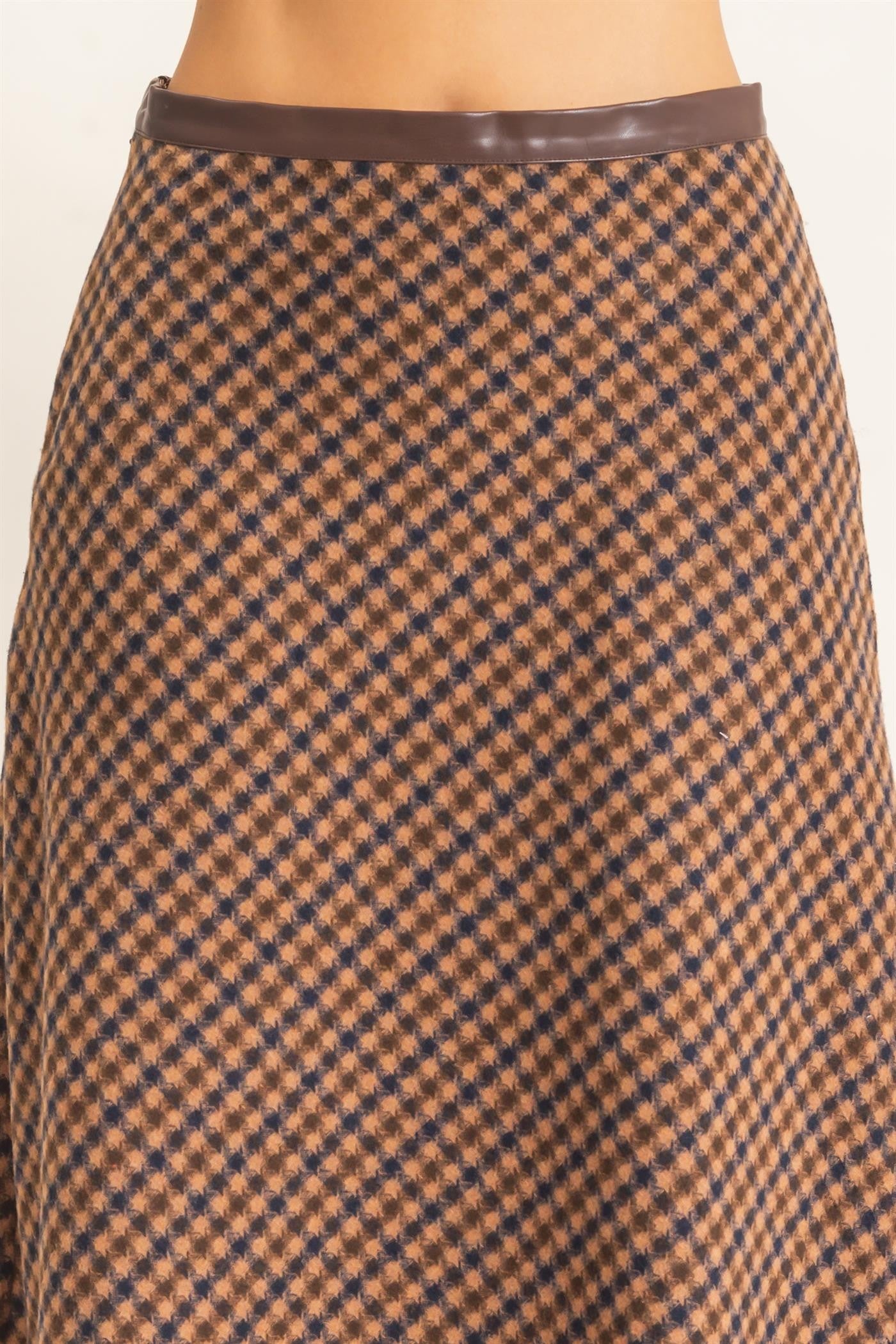 A sophisticated checkered A-line midi skirt featuring a sleek faux leather waistband and flattering flare for effortlessly polished style.
