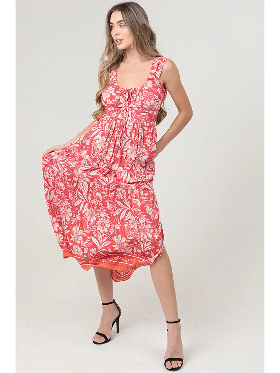 Bohemian floral maxi dress featuring an open back and side slit