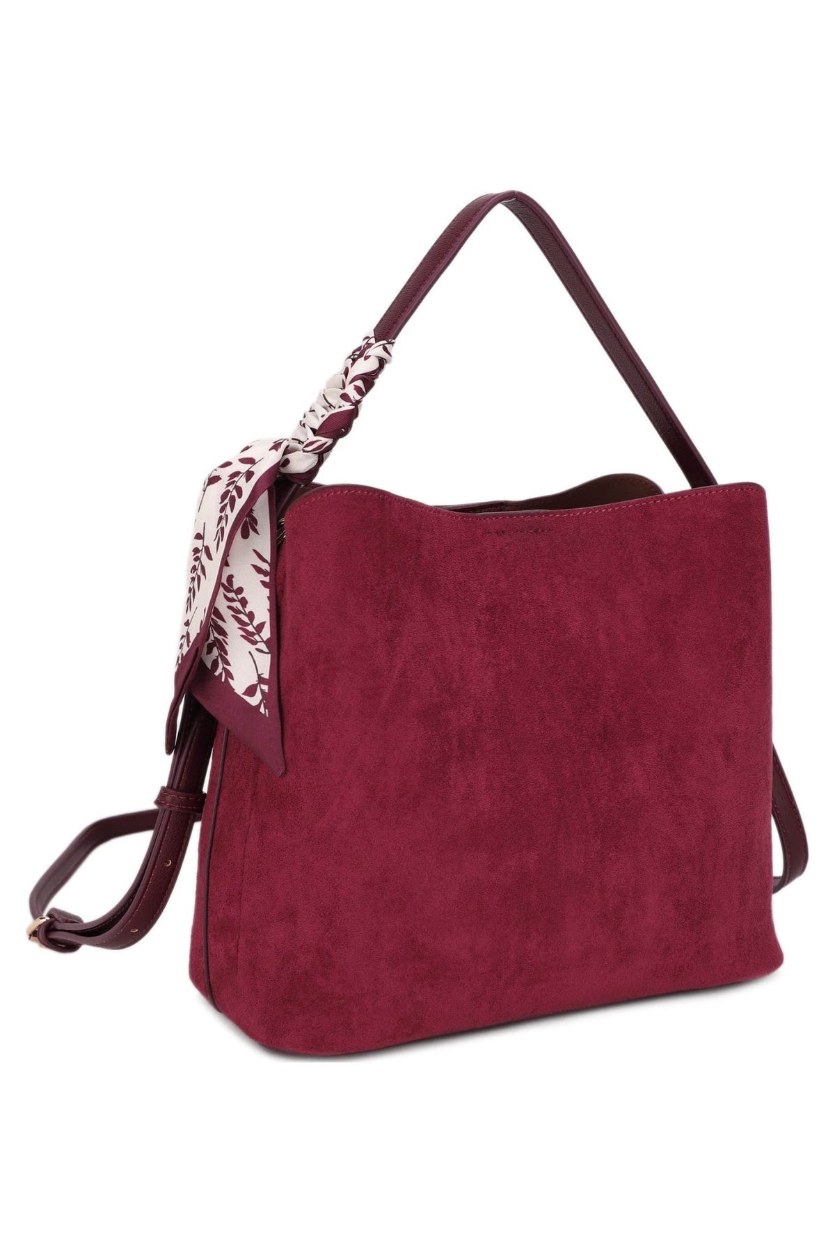 A chic vegan suede shoulder bag featuring a printed scarf accent, contrasting trim, and versatile strap options for an effortlessly polished look.

