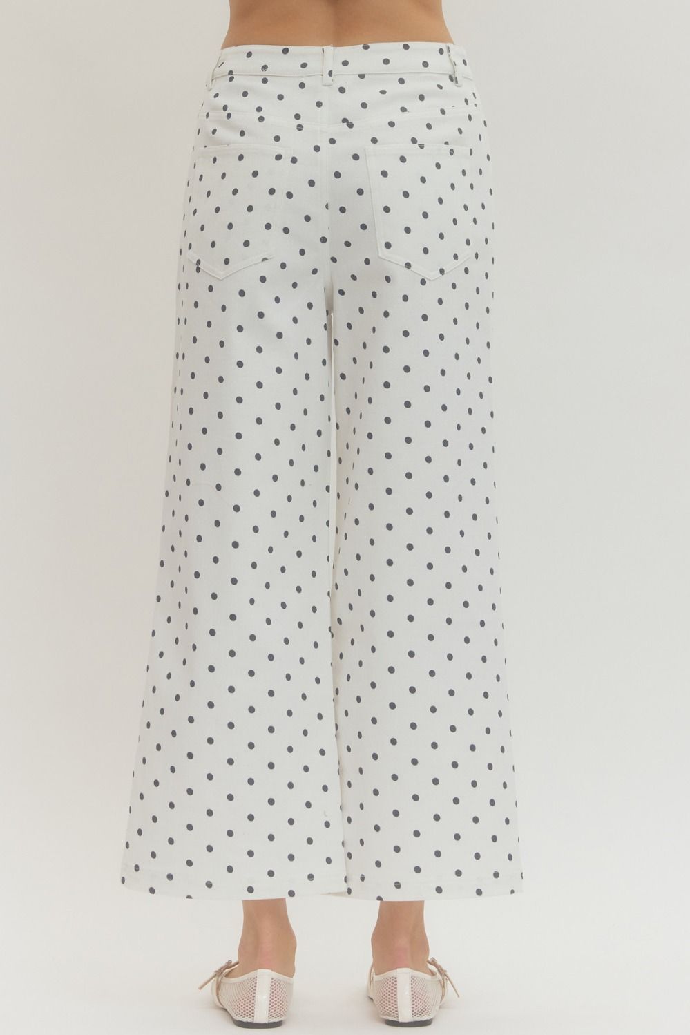 wide-leg pants with polka dot print, button and zip-fly closure, and functional pockets
