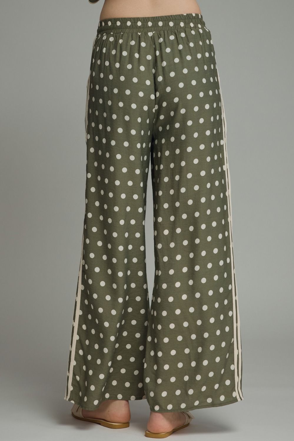 back of Playful polka dot pants with a relaxed wide leg silhouette, contrast trim, and an adjustable drawstring waist for effortless everyday style.