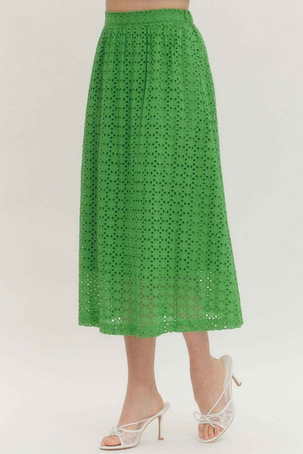 cotton midi skirt with eyelet detailing, elastic back waistband, side zipper, and side pocket