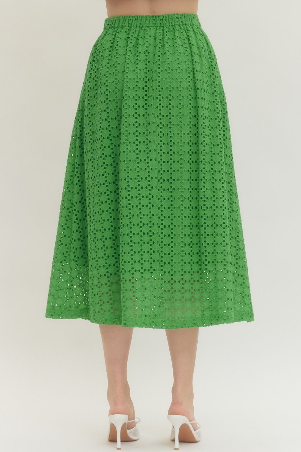 cotton midi skirt with eyelet detailing, elastic back waistband, side zipper, and side pocket