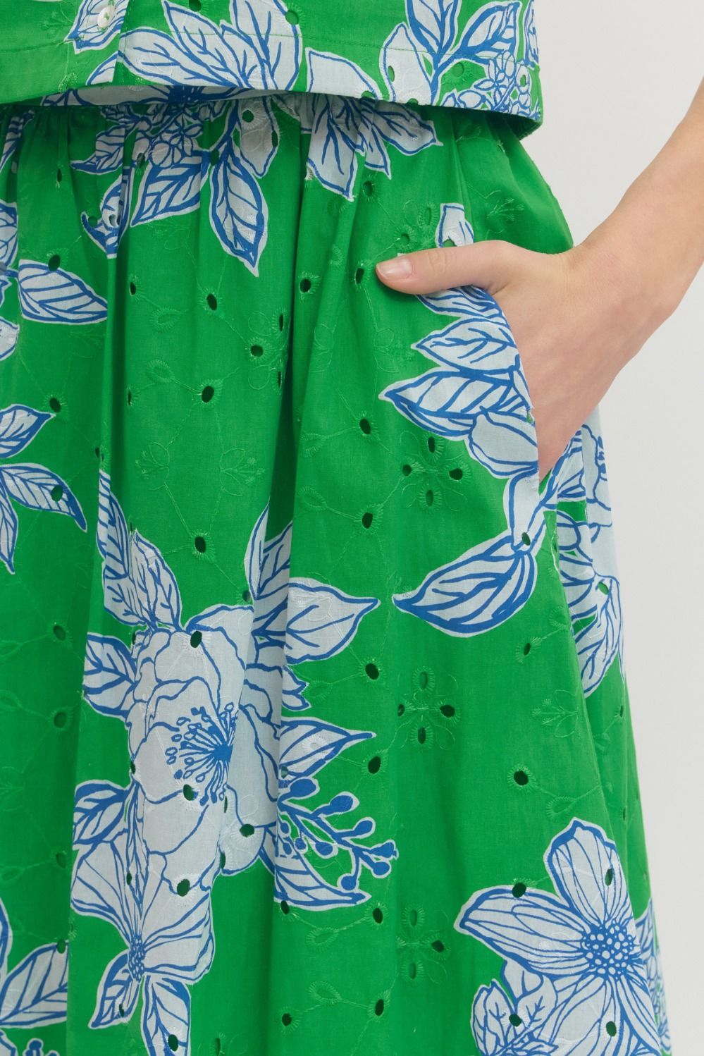 cotton midi skirt with botanical eyelet print, elastic back waistband, and side pockets