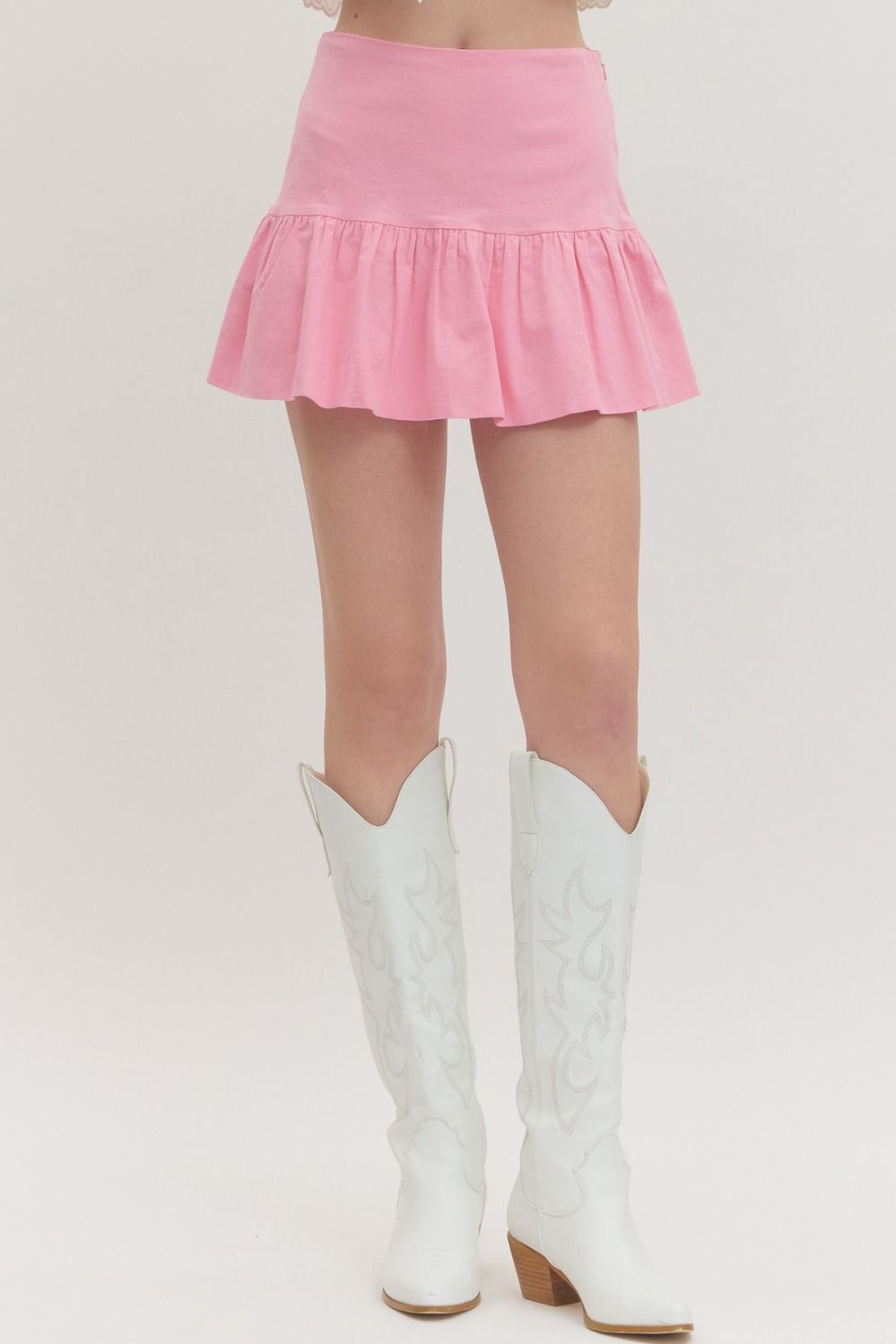 high-waist skirt with ruffle hem, side zipper, and built-in shorts lining