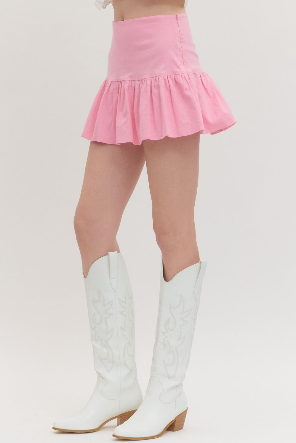 high-waist skirt with ruffle hem, side zipper, and built-in shorts lining