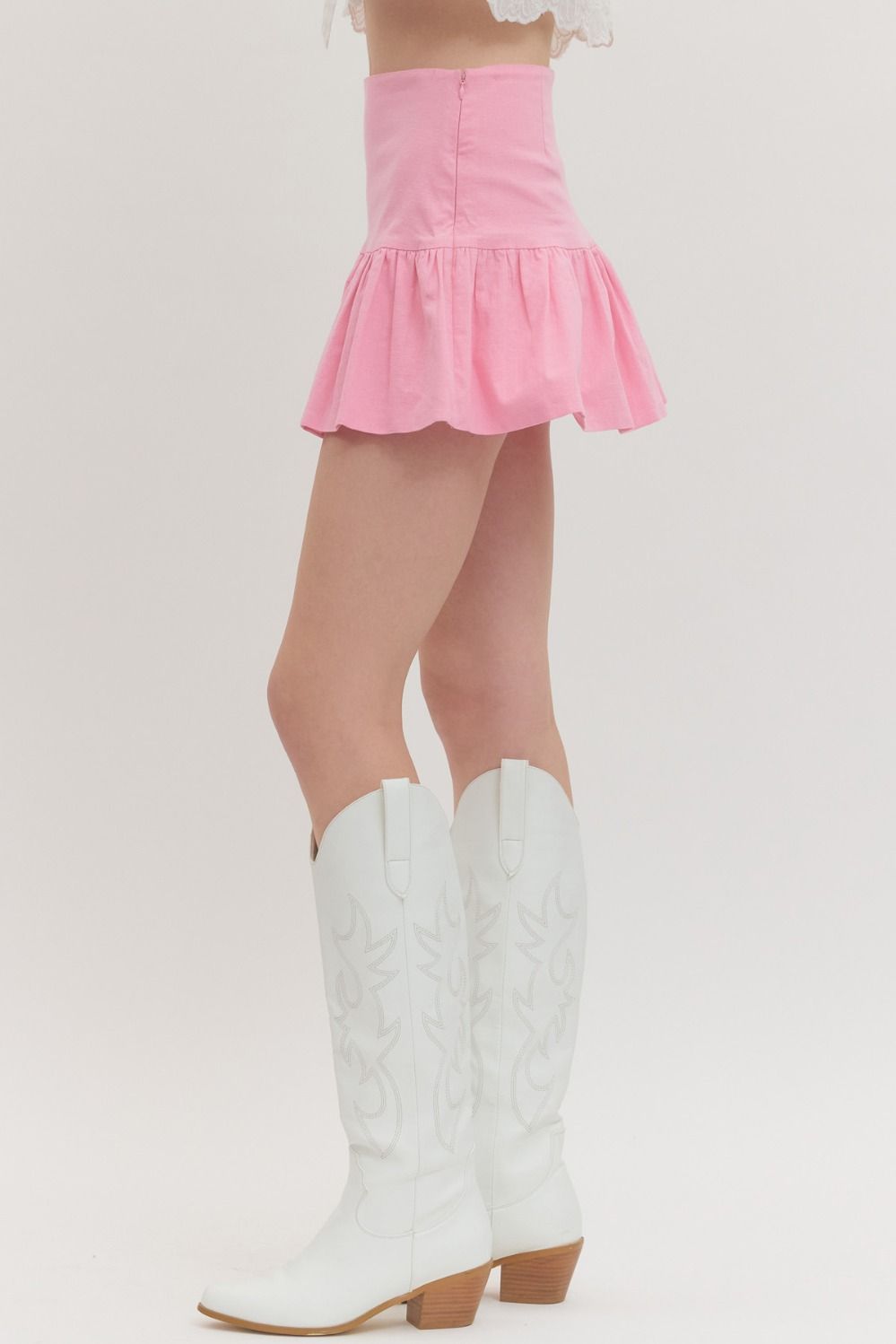 high-waist skirt with ruffle hem, side zipper, and built-in shorts lining