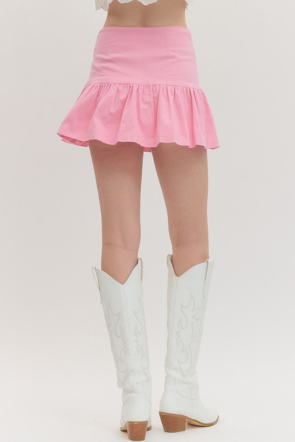 high-waist skirt with ruffle hem, side zipper, and built-in shorts lining