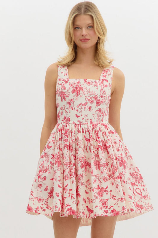 vintage-inspired floral print dress with a fitted bodice and flared skirt."