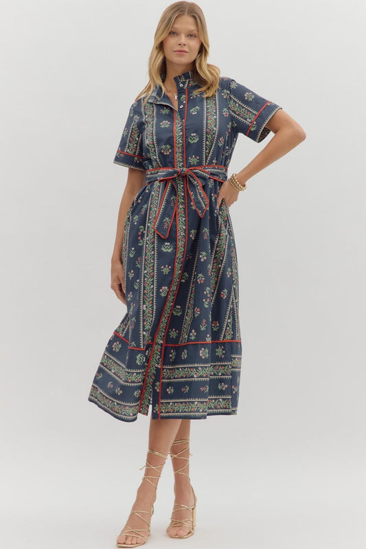A breezy, cotton midi shirtdress with a ruffle-pleated neckline, contrast inset details, and a removable belt—effortless, flattering, and ready for every day.
