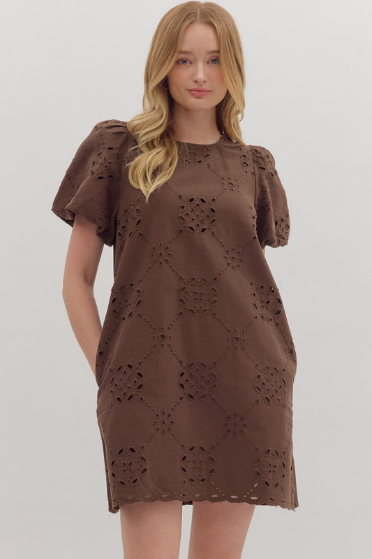 Romantic and refined, the Lenora mini dress charms with puff sleeves, scalloped edges, and timeless eyelet embroidery.