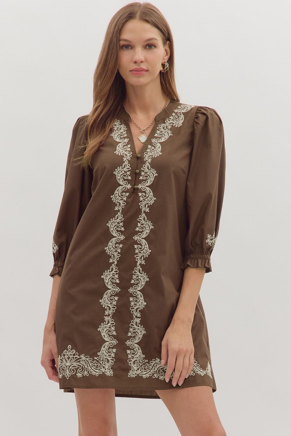 Delicate embroidery and breezy details make the Marcelline mini dress a timeless wardrobe essential.