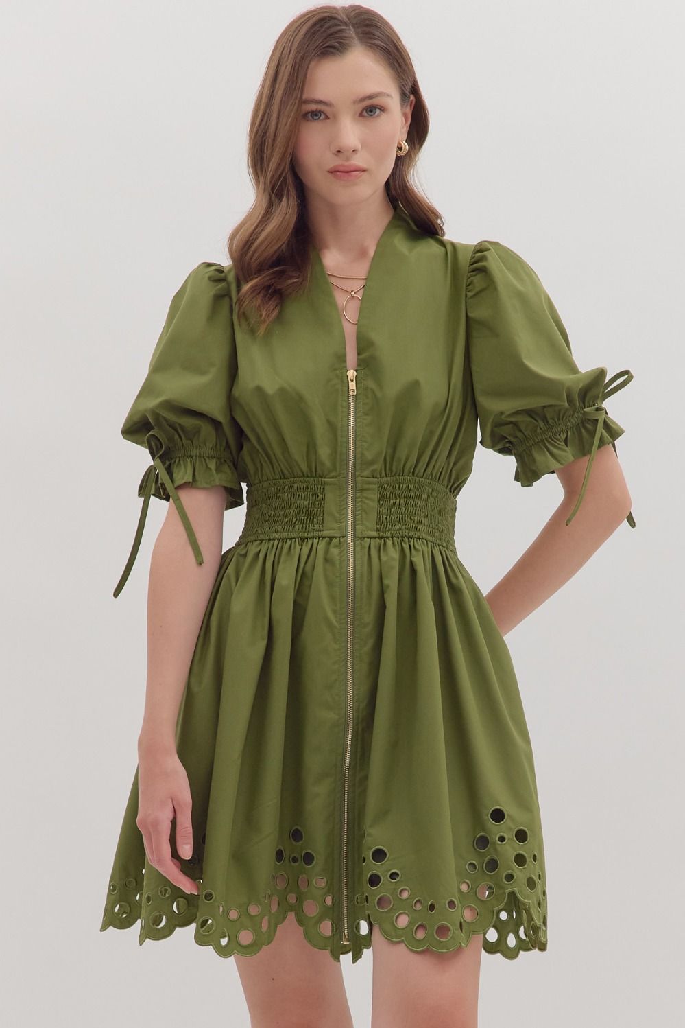 Flirty and flattering, the Ivy mini dress pairs romantic puff sleeves with a smocked waist, V-neck, and scalloped eyelet hem for instant outfit magic.