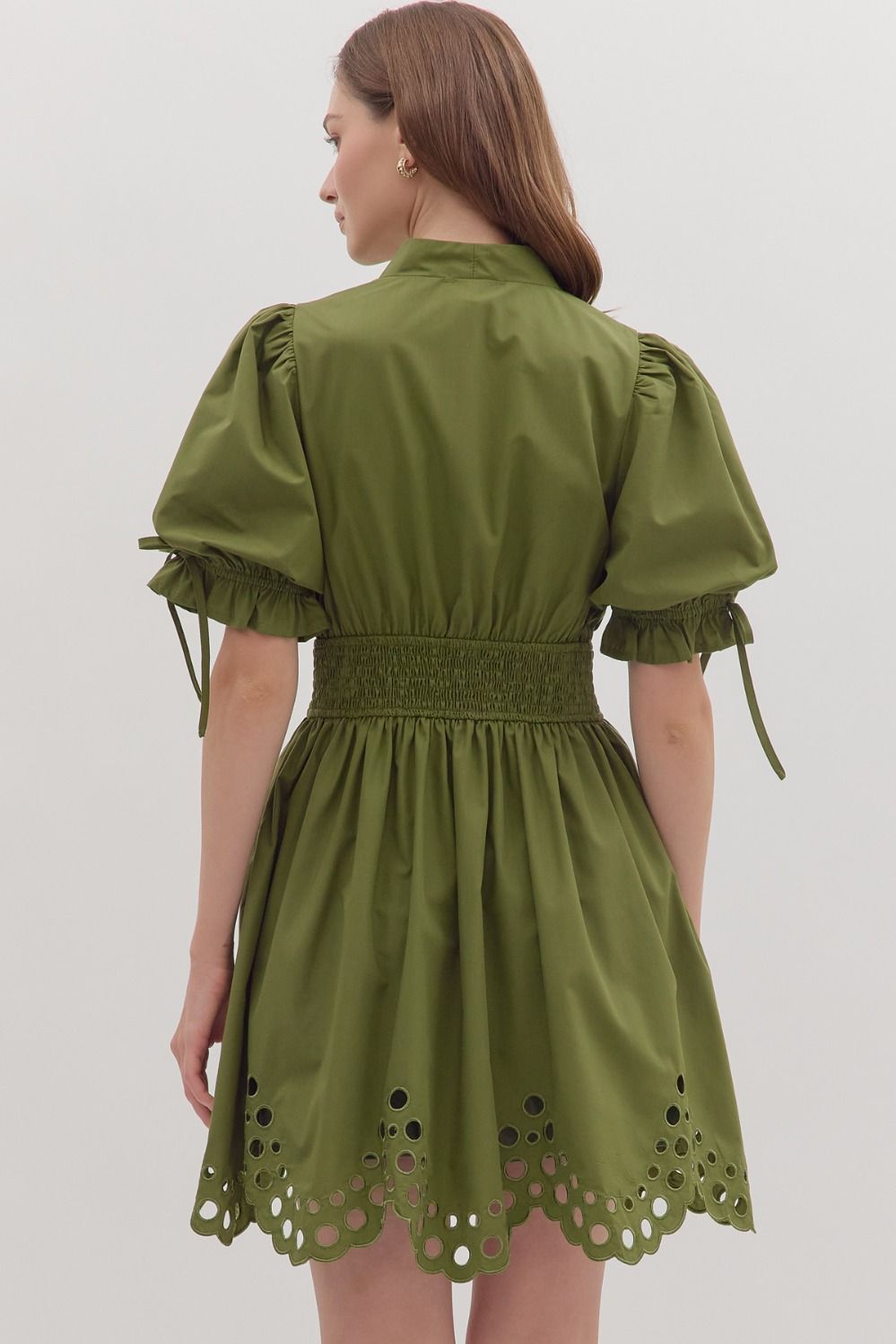 Flirty and flattering, the Ivy mini dress pairs romantic puff sleeves with a smocked waist, V-neck, and scalloped eyelet hem for instant outfit magic.