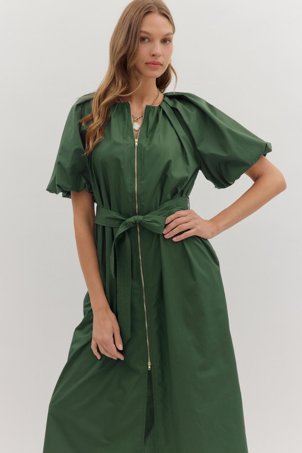 Elegant and versatile, the Odette dress features a gathered neckline, puff sleeves, and a removable self-tie belt for a flattering fit.