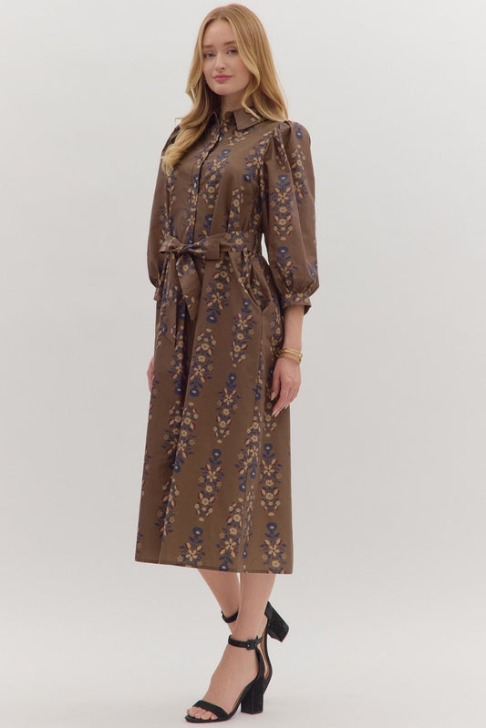 Effortlessly feminine, the Cecily midi dress pairs a botanical print with puff sleeves, a detachable waist tie, and timeless everyday ease.