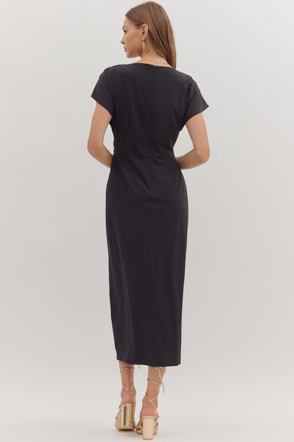 Sleek and flattering, the Odessa midi dress features a softly draped neckline and side ring gathering for a sculpted, event-ready silhouette.