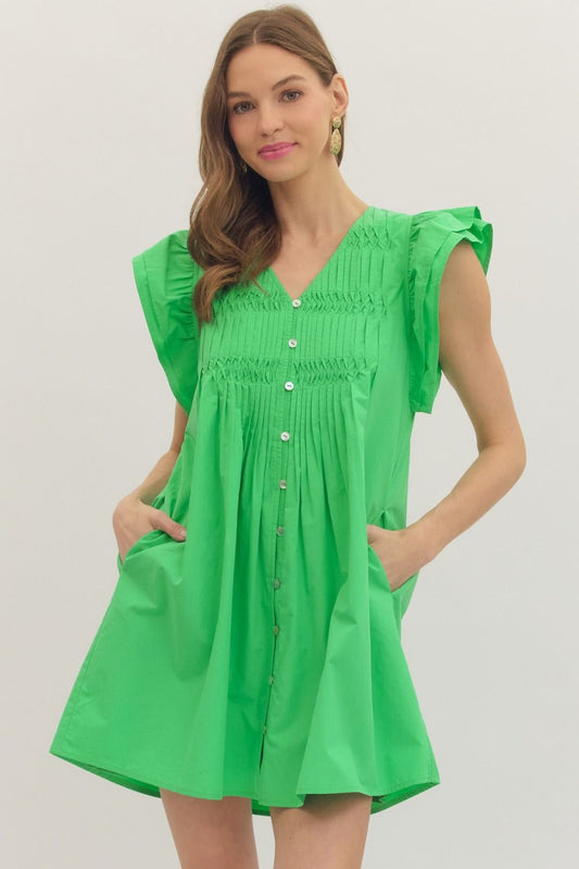 cotton mini dress with flutter sleeves, pintuck pleating, and a relaxed, feminine silhouette