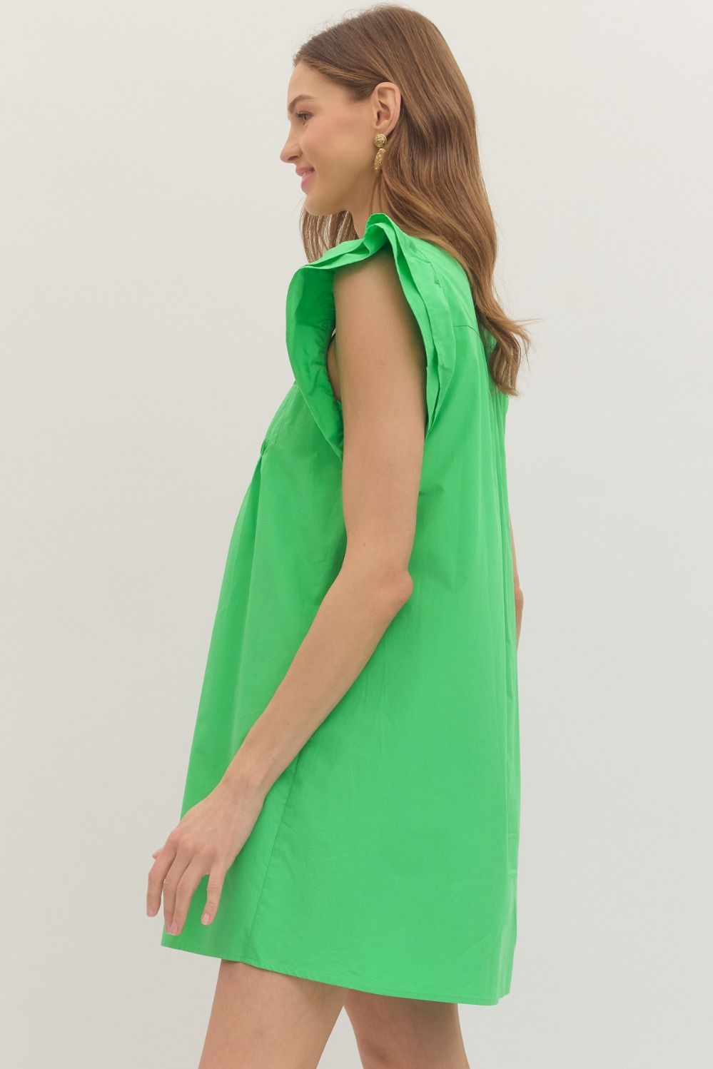 cotton mini dress with flutter sleeves, pintuck pleating, and a relaxed, feminine silhouette