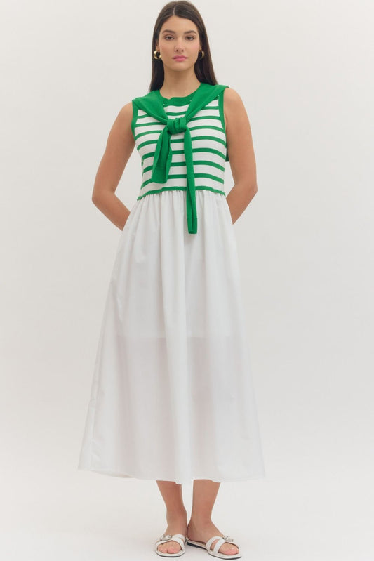 Striped sleeveless midi dress with contrast sweater overlay
