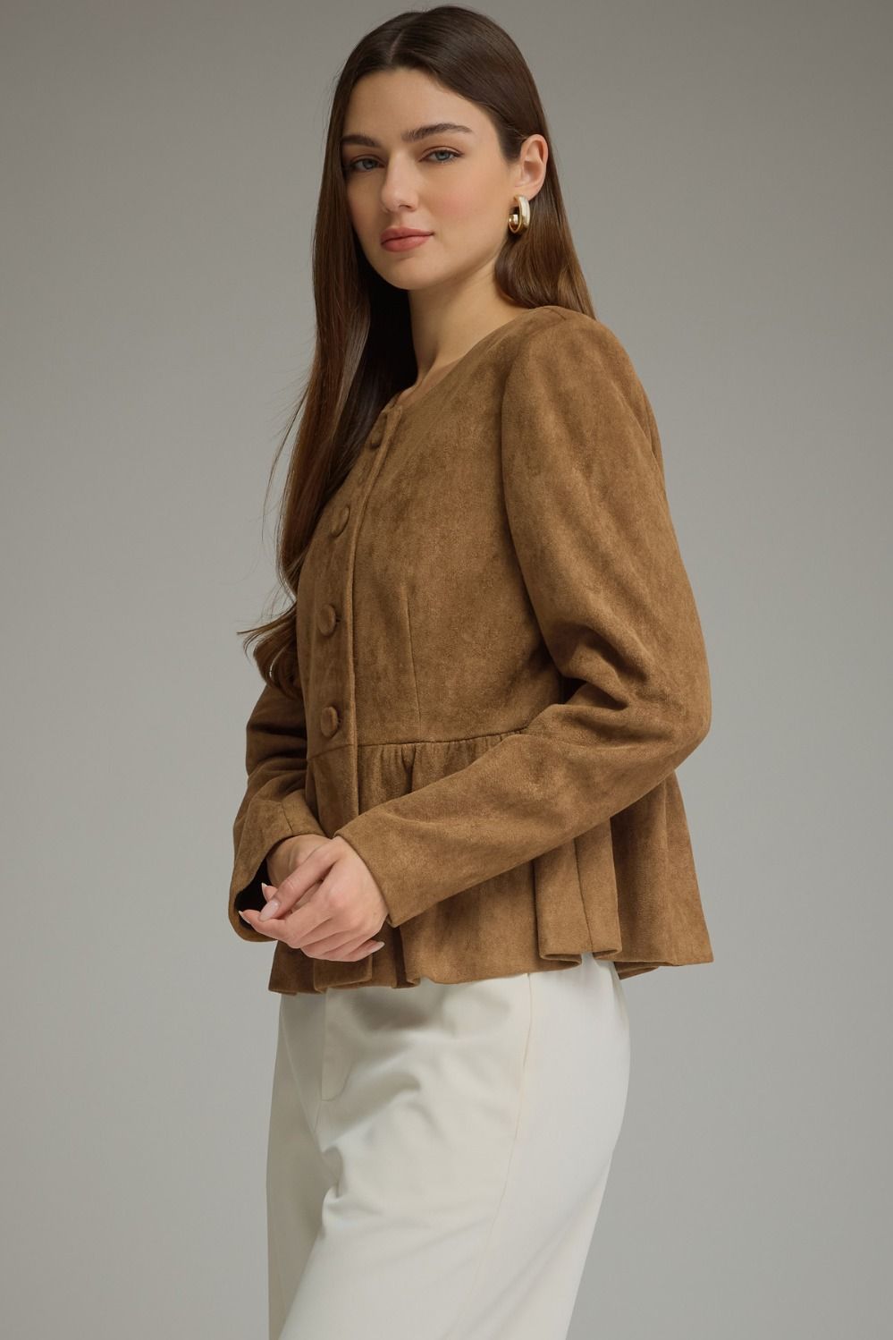 Solid woven women's jacket with round neckline, long sleeves, fabric-covered buttons, and gathered peplum hem