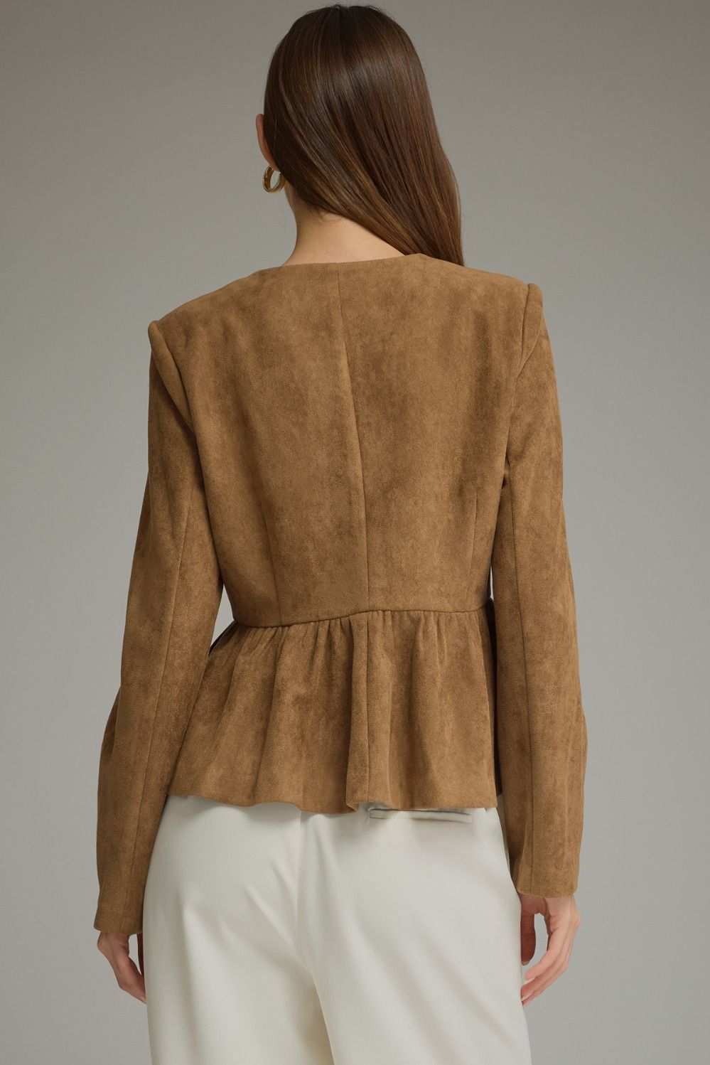 Solid woven women's jacket with round neckline, long sleeves, fabric-covered buttons, and gathered peplum hem