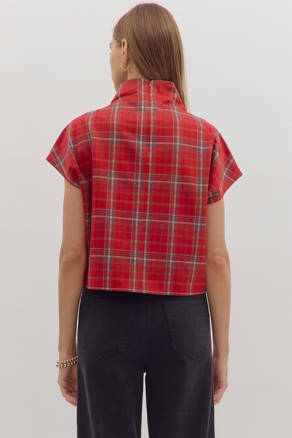 Classic plaid meets modern edge in the Maribel top, designed with a chic mock neck and sleek short sleeves.