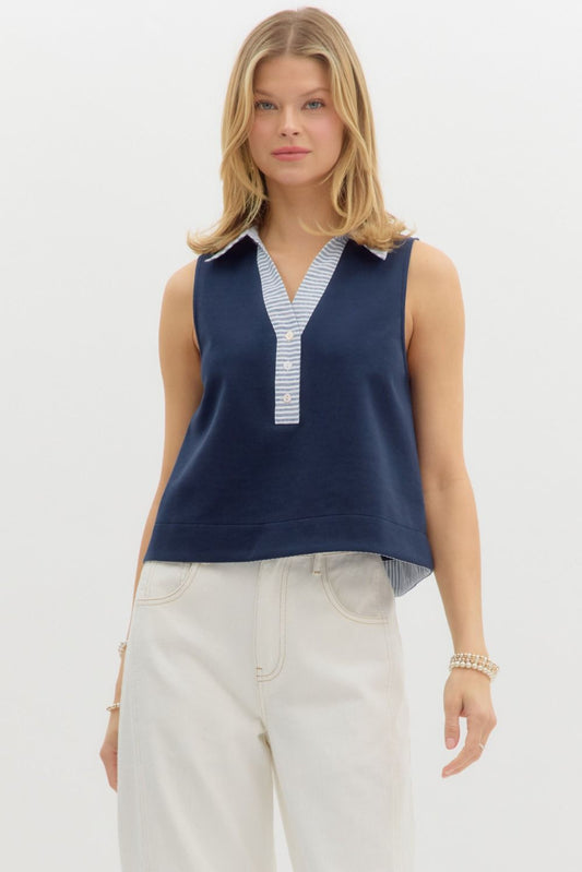  sleeveless navy top featuring a contrast striped collar and button-down placket