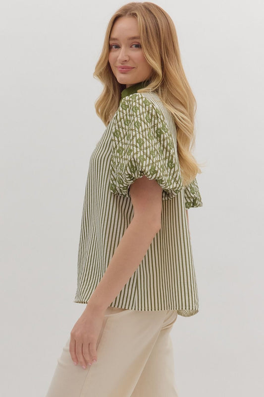 Playful yet refined, the Sylvie top pairs bold stripes with embroidered puff sleeves and contrast trim.