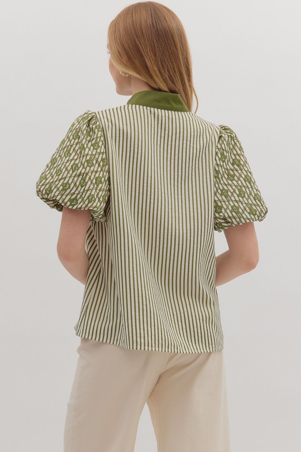 Playful yet refined, the Sylvie top pairs bold stripes with embroidered puff sleeves and contrast trim.