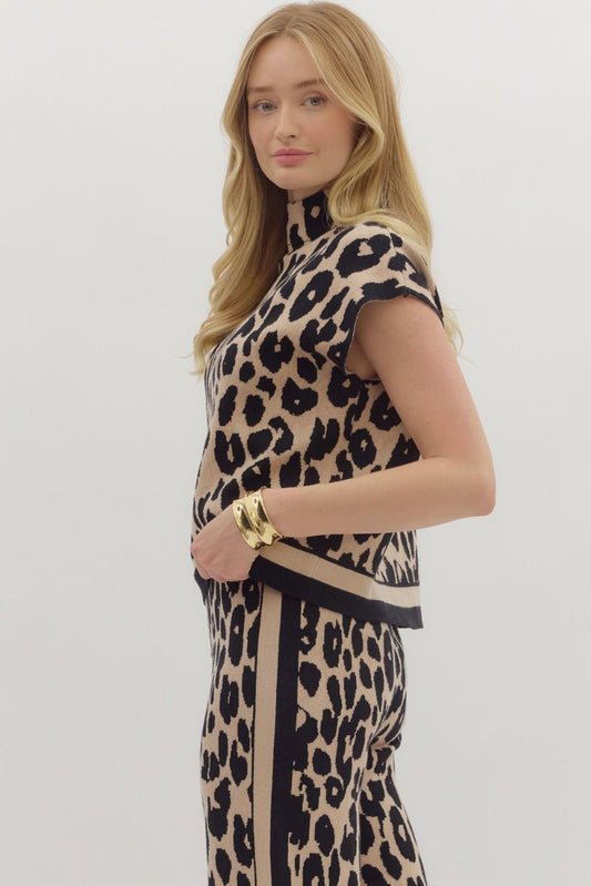 The Liora sweater top blends cozy knit comfort with a chic animal print and polished mock neckline.