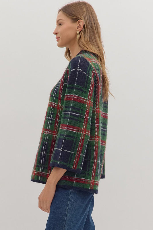 Cozy and classic, the Imogen sweater blends plaid patterning with a relaxed mock neck silhouette.