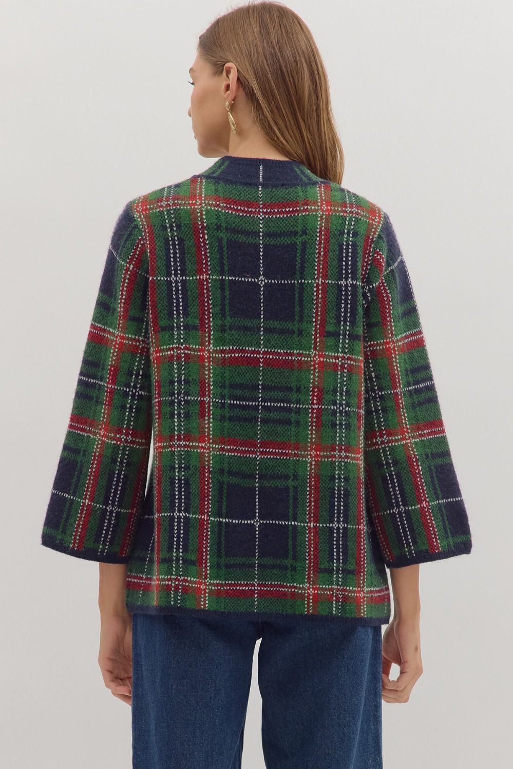 Cozy and classic, the Imogen sweater blends plaid patterning with a relaxed mock neck silhouette.
