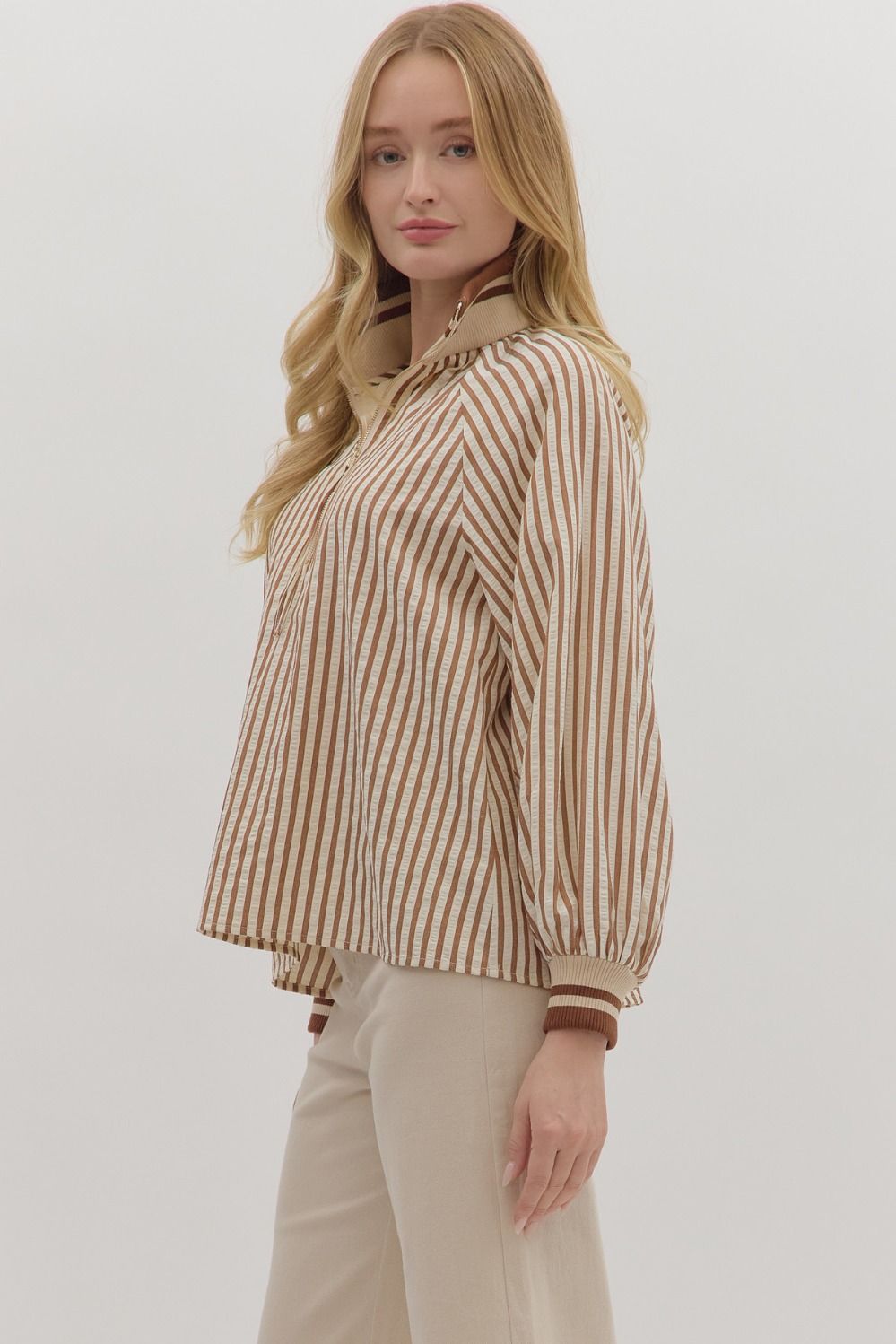 The Maribelle top combines classic stripes with a sporty quarter-zip for effortless everyday style.