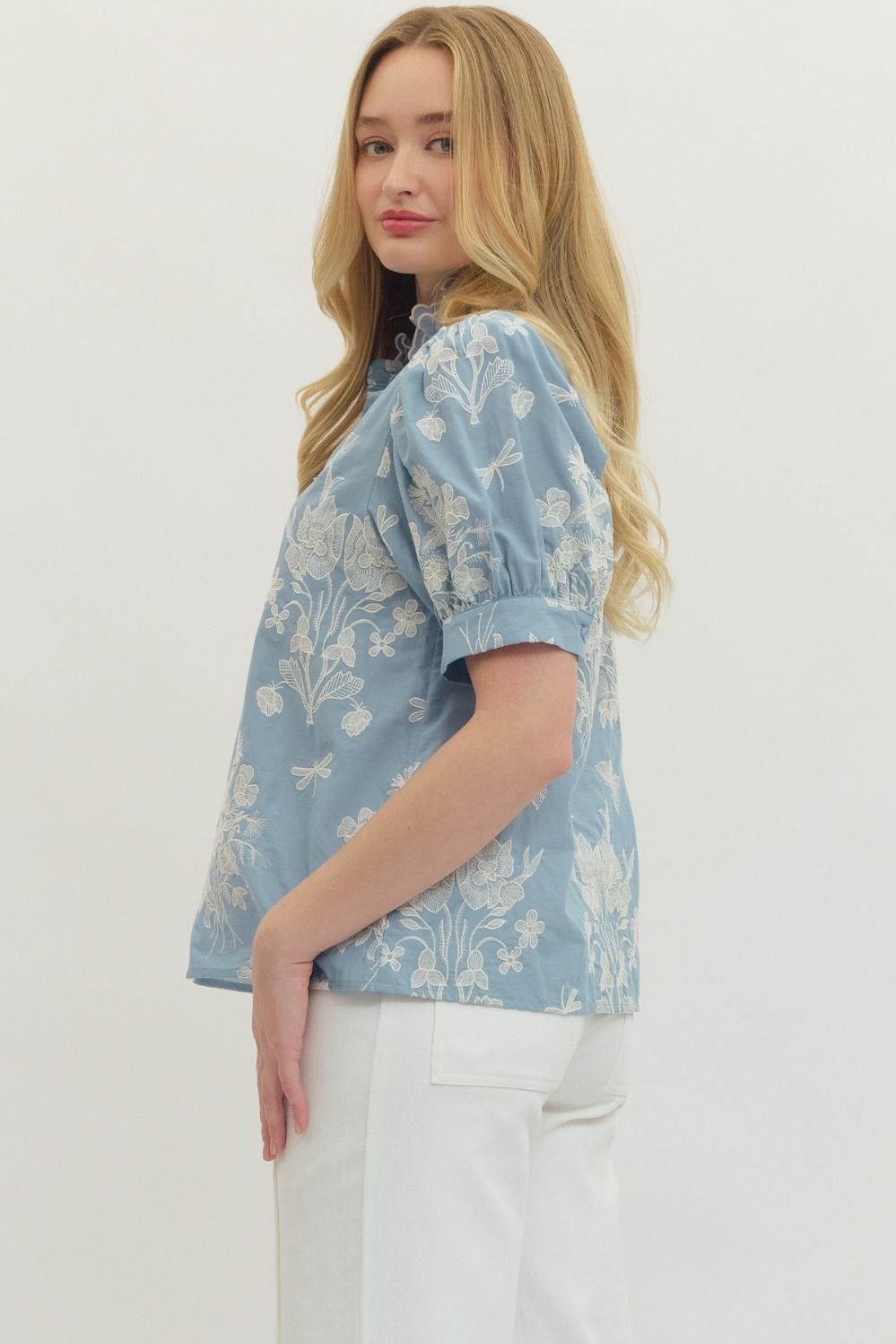 cotton top with embroidered detailing, scalloped mock neck, and short puff sleeves