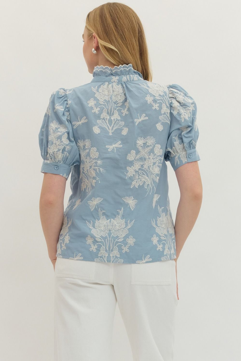 cotton top with embroidered detailing, scalloped mock neck, and short puff sleeves