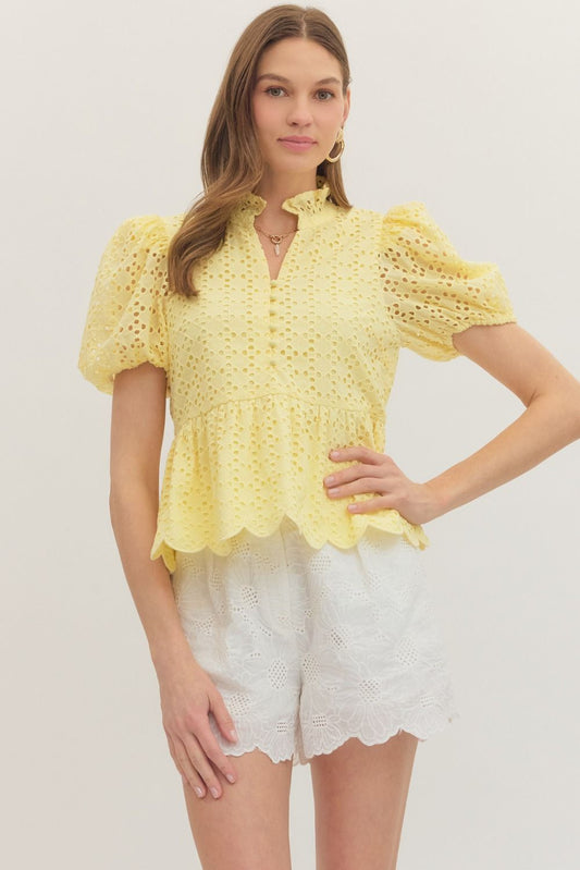 cotton top with puff sleeves, eyelet embroidery, ruffled V-neck, and scallop-trimmed hem