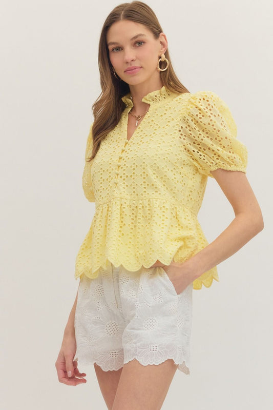 cotton top with puff sleeves, eyelet embroidery, ruffled V-neck, and scallop-trimmed hem