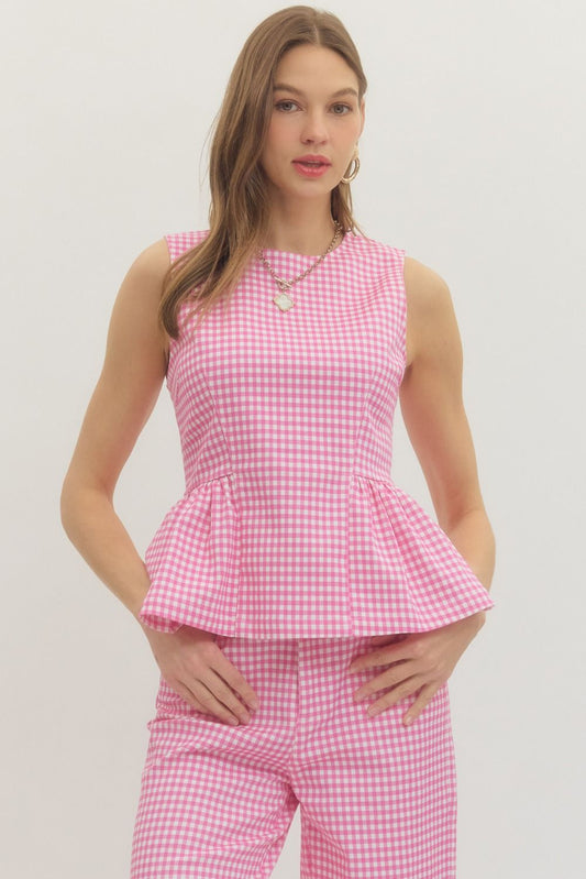 gingham sleeveless top with a structured waist seam and flattering peplum silhouette