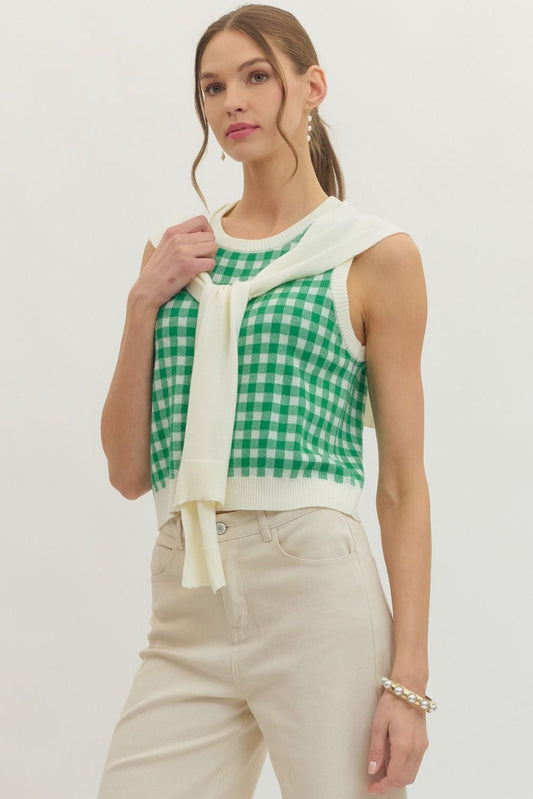 lightweight sleeveless gingham knit top with a draped sweater detail tied at the front.