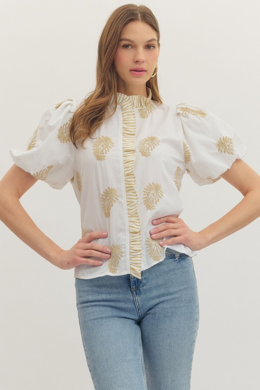 cotton top with botanical embroidery, puff sleeves, and ruffle-trim placket detail