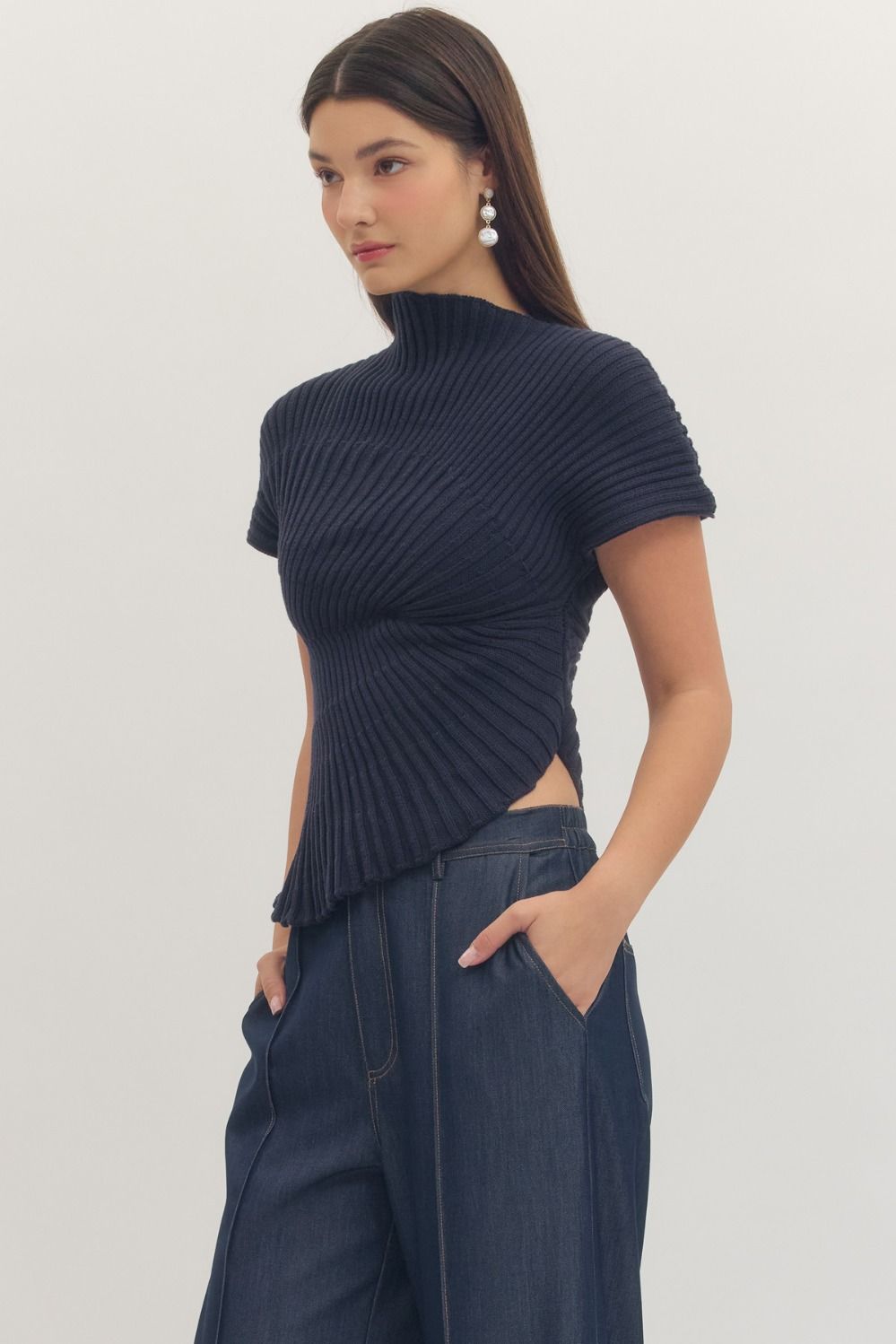  cotton ribbed knit top with cap sleeves and a modern asymmetric hem