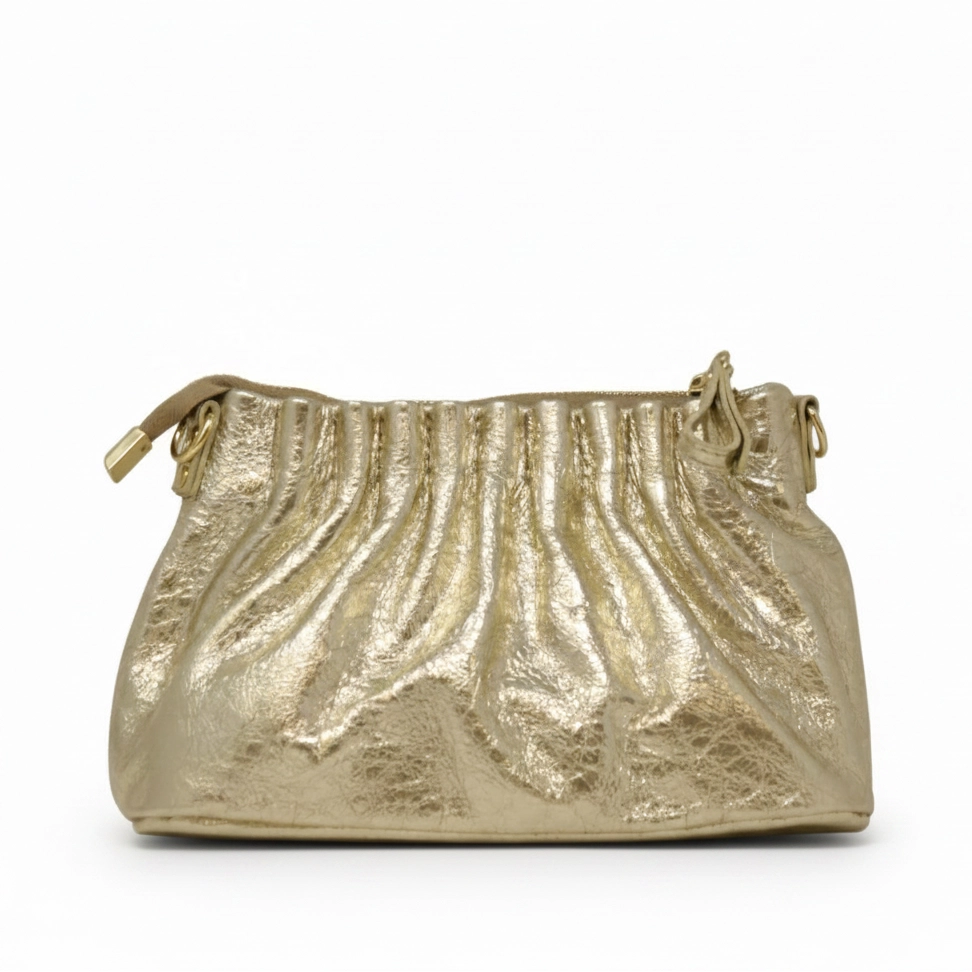 A metallic gold handbag with a gathered, pleated texture and a small gold zipper pull, shown against a plain white background.