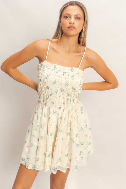 Floral Shirred Mini Dress features a fully shirred bodice, adjustable spaghetti straps