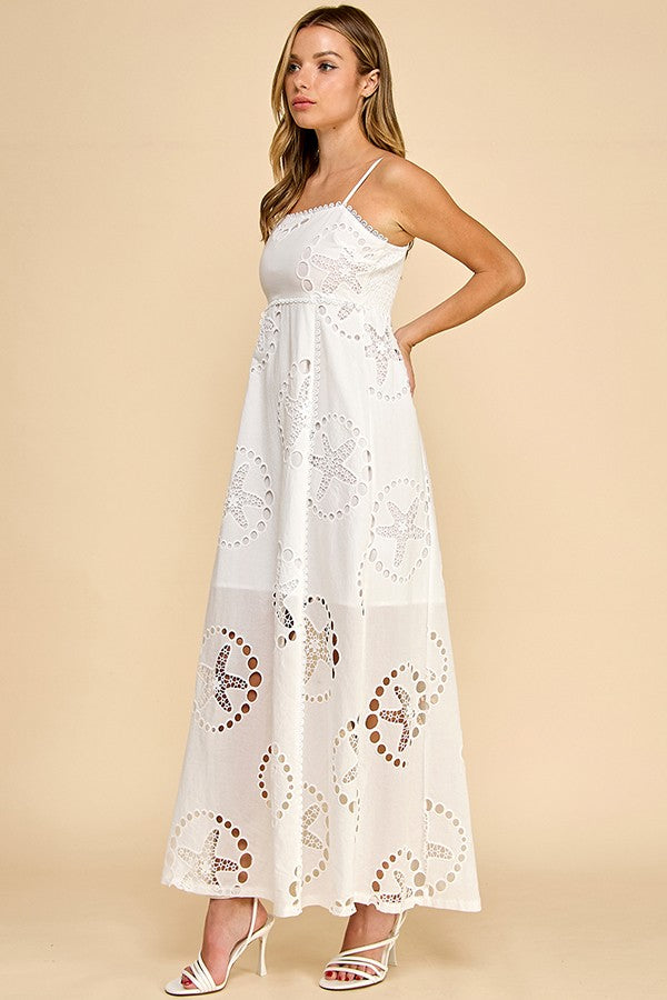 embroidered broderie cotton maxi dress with delicate lace trim and a flowing silhouette